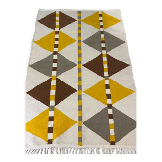 Woven carpet with large diamond patterns and parallel strokes, 245x168 cm