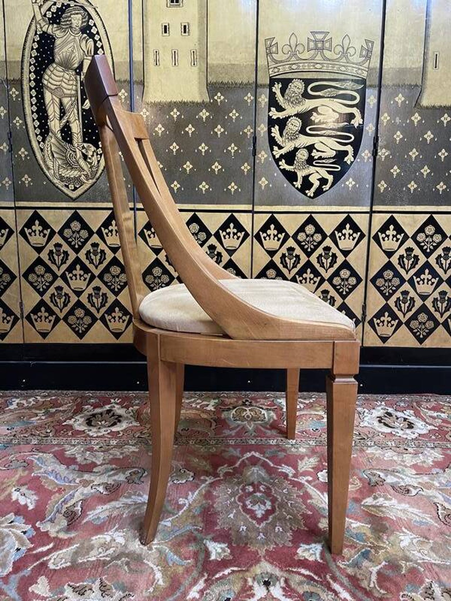 Suite de 6 chaises gondoles de style Empire