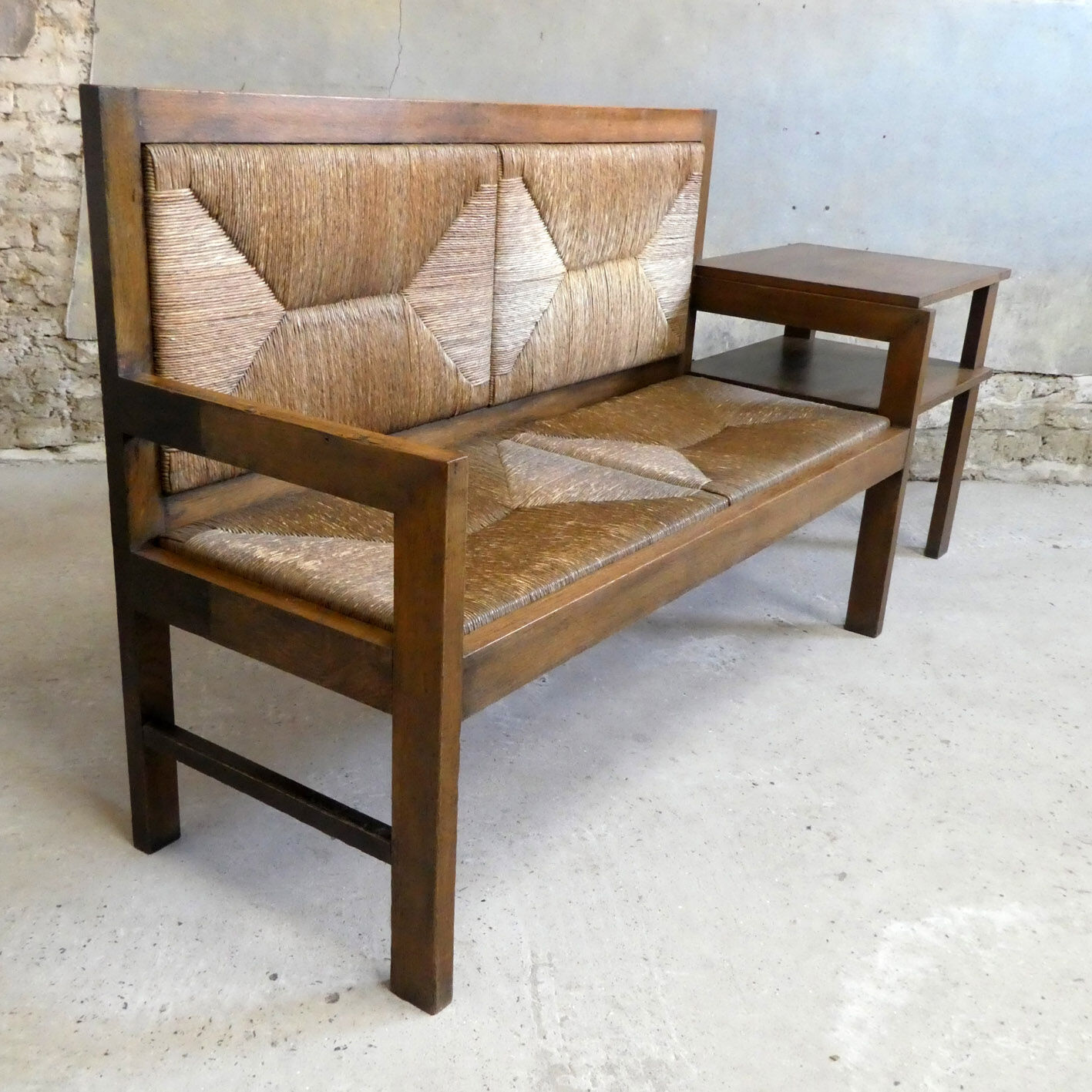 large oak and straw bench, 1930