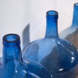 3 dame-Jeanne en verre bleu, vers 1920