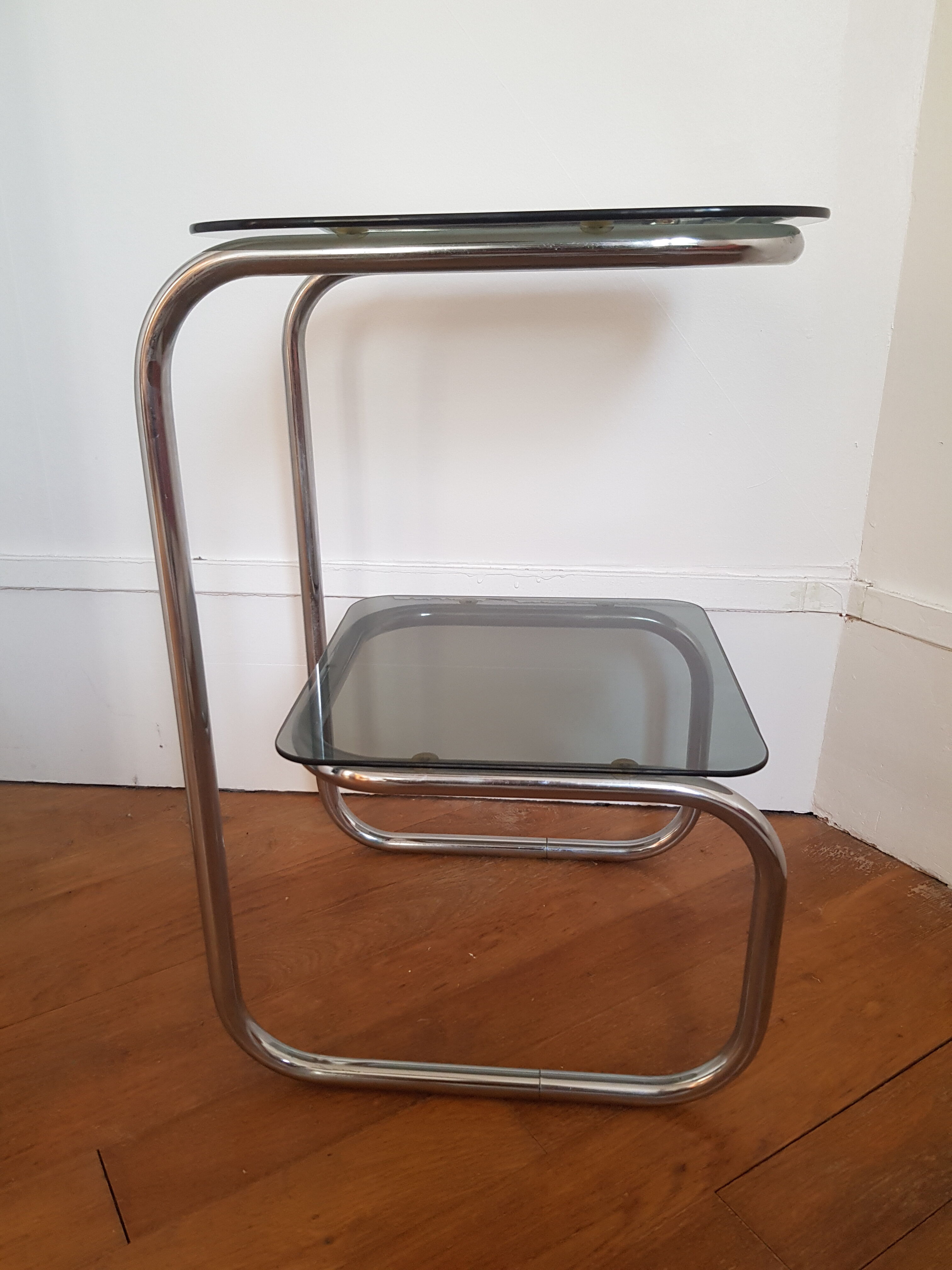 Metal console and smoked glass