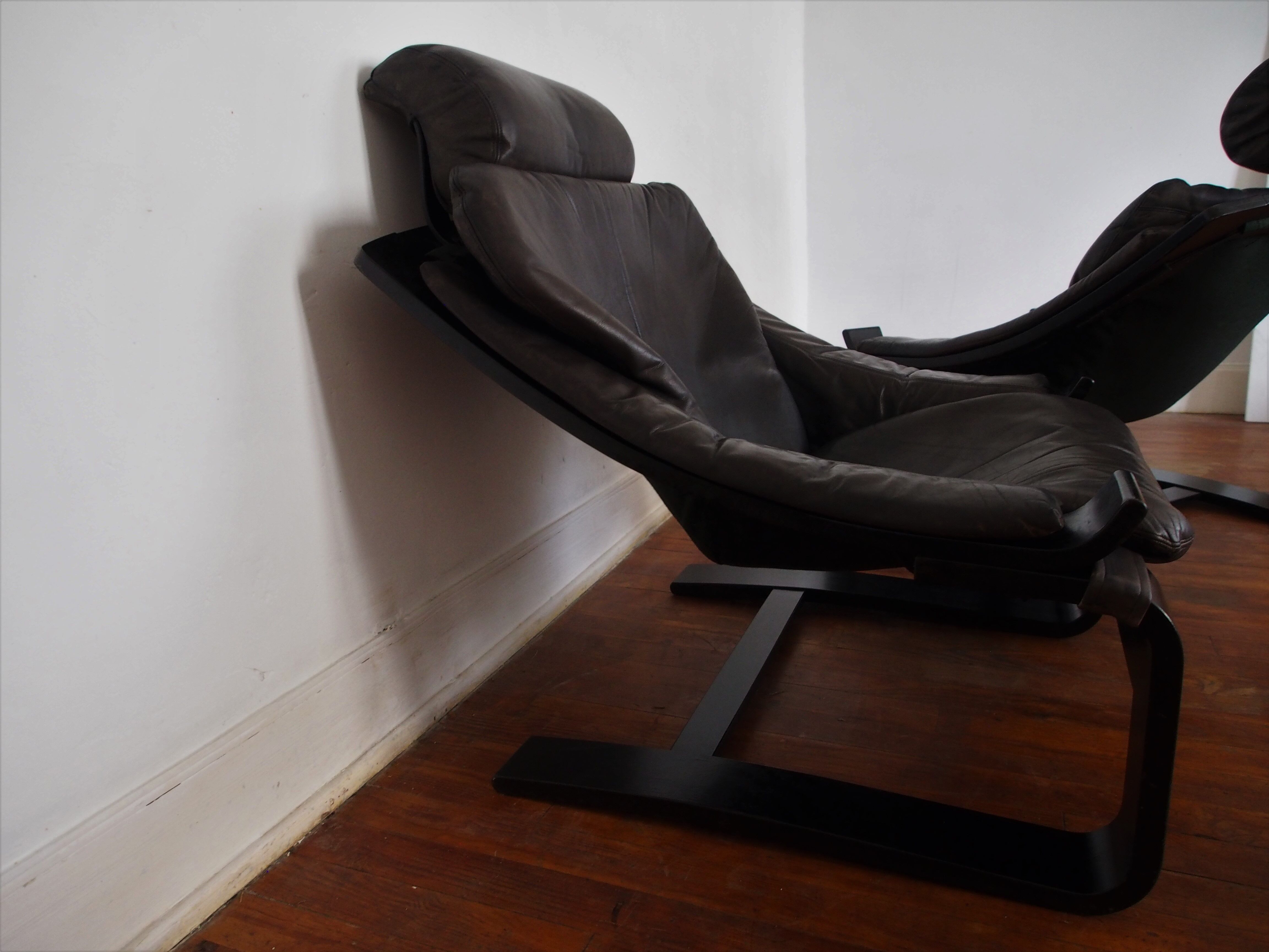 Pair of Scandinavian armchairs and footrests