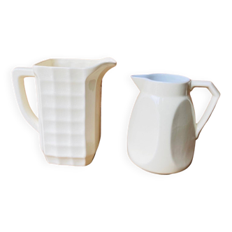 Duo of old ceramic pitchers.