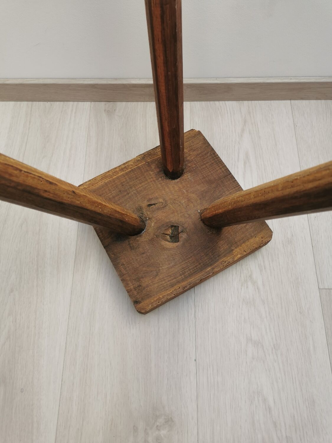 Old wooden stool tripods