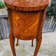 Old oval bedside table in rosewood marquetry Louis XV style