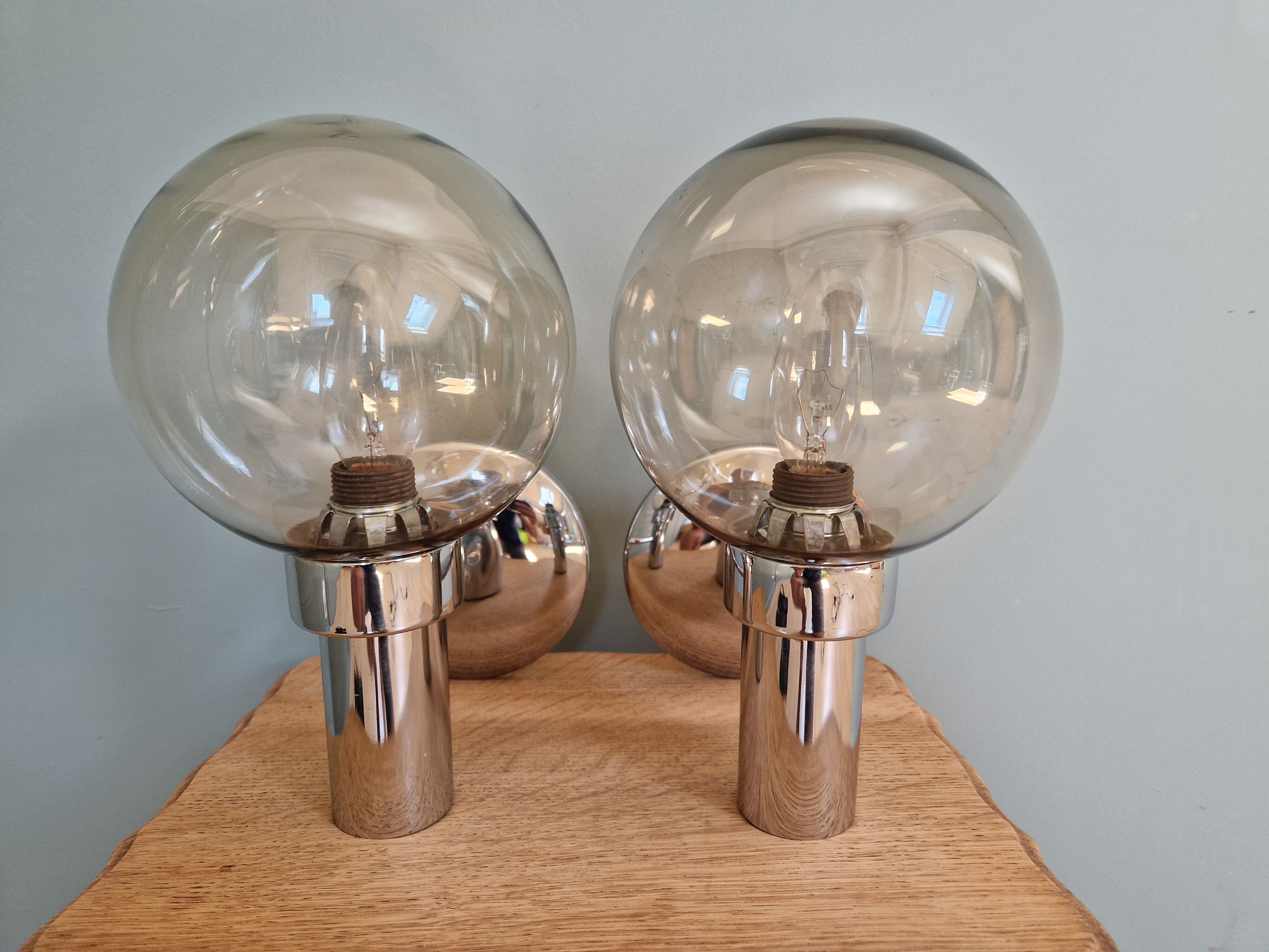 Pair of vintage wall lights in chromed metal and smoked glass, 70s