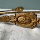 Pair of Napoleon III gilt bronze tiebacks