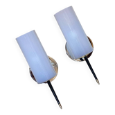 Pair of vintage wall sconces in plexiglass plastic and brass.