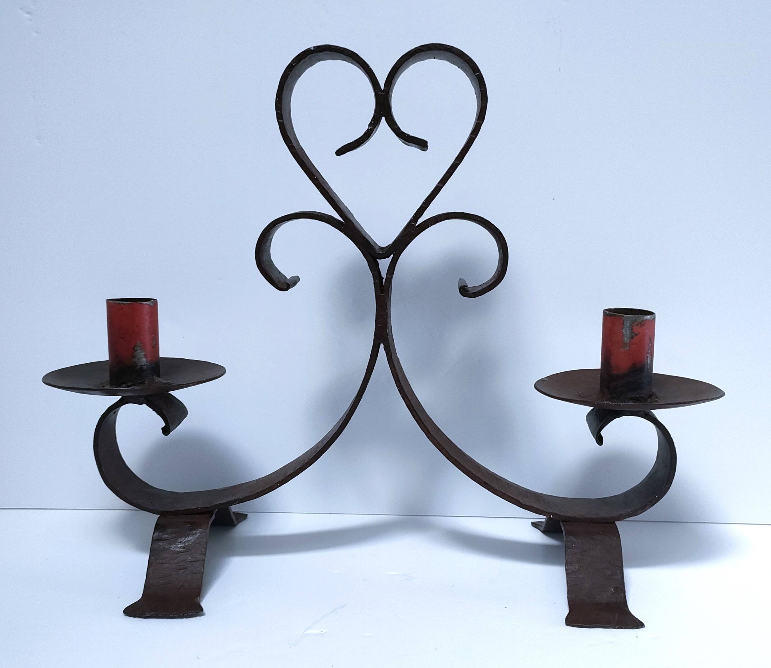 Patinated wrought iron candle holder heart pattern two lights