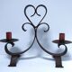 Patinated wrought iron candle holder heart pattern two lights