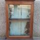 Old wardrobe with glass door