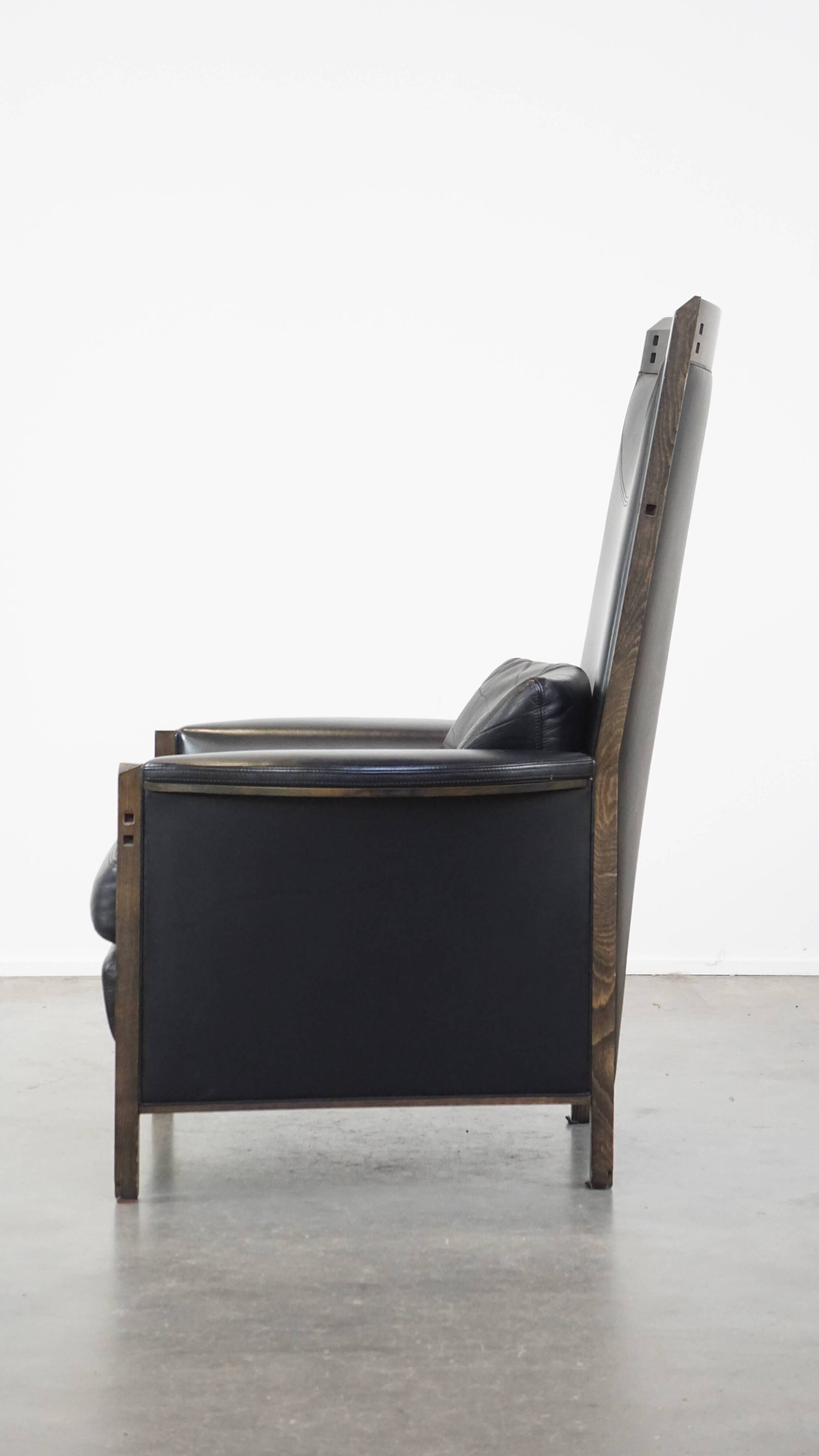Fauteuil design en cuir noir de Giorgetti
