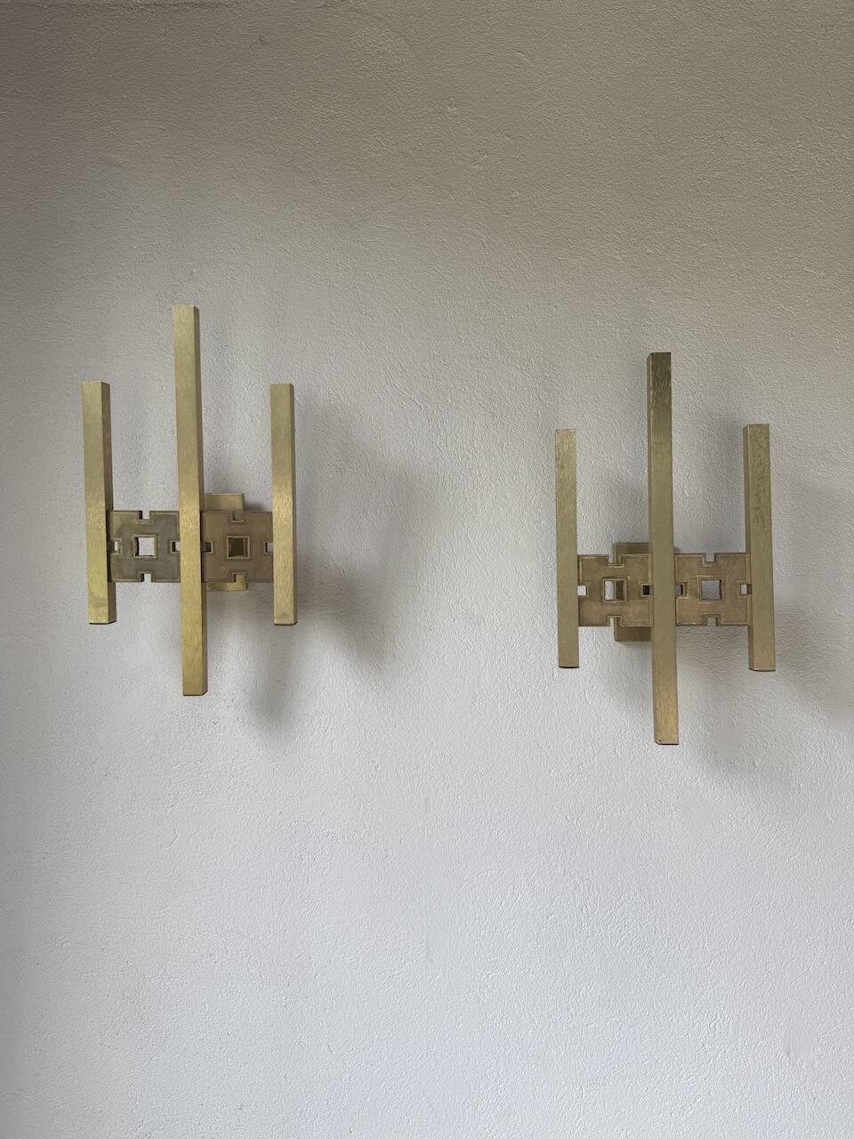 Pair of Regency brass wall lights in Italy