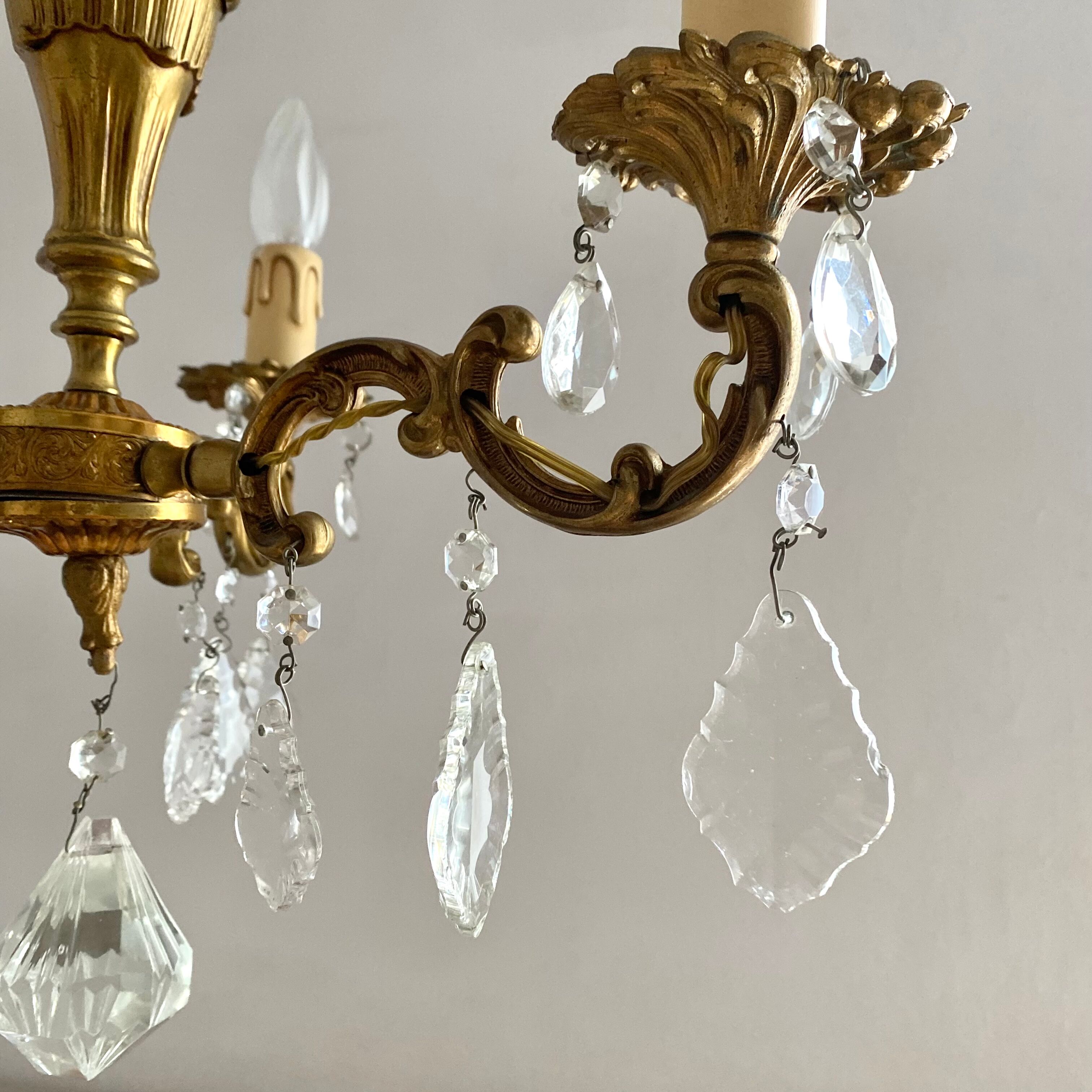 Chandelier with tassels and brass