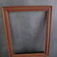 Large old frame in worked wood