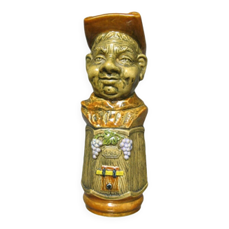 Old bottle in the shape of "joufflu monk".