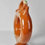 Circular glazed terracotta gargoulette