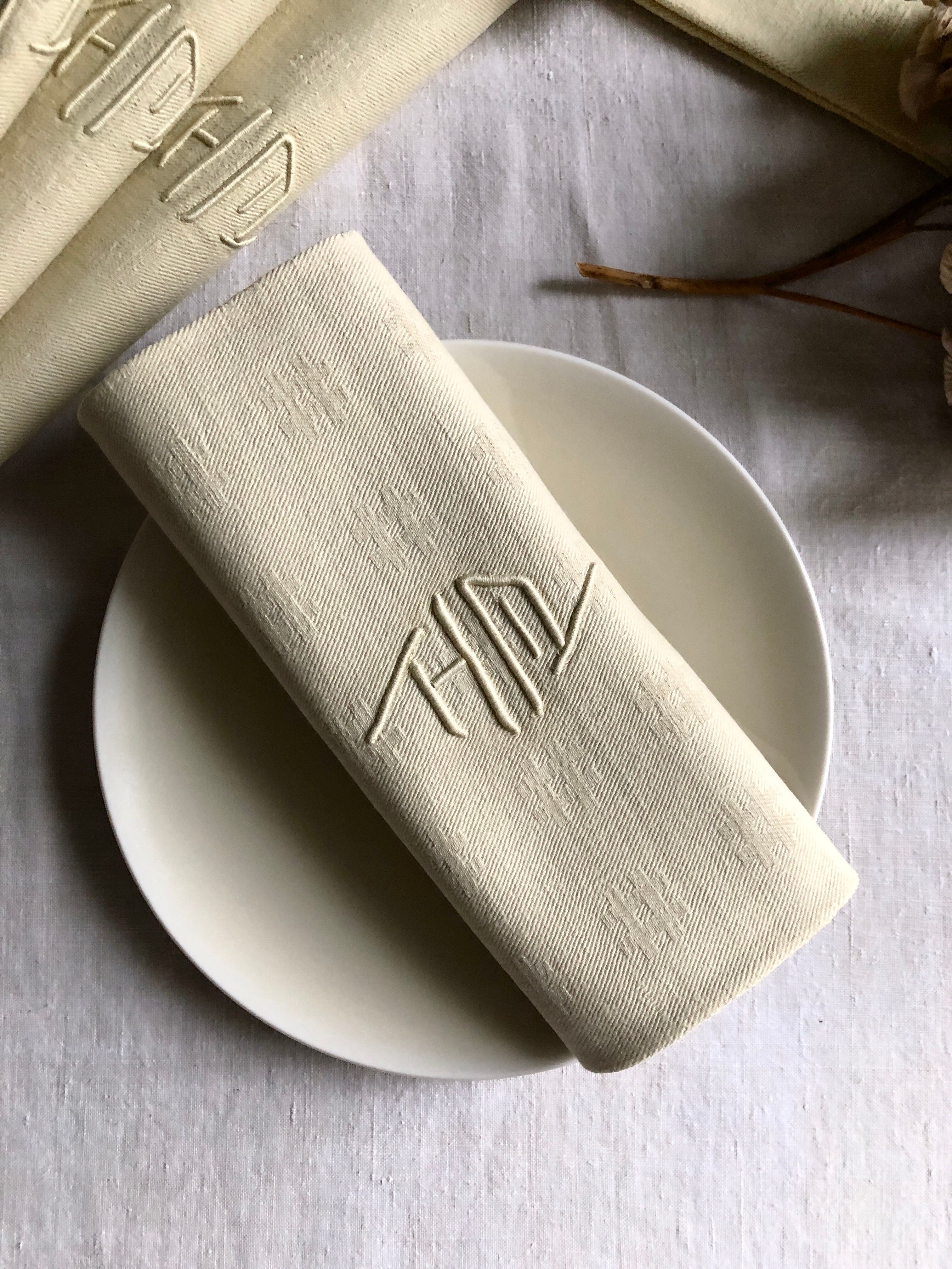 Antique napkins damascus and monogrammed tinted fresh butter