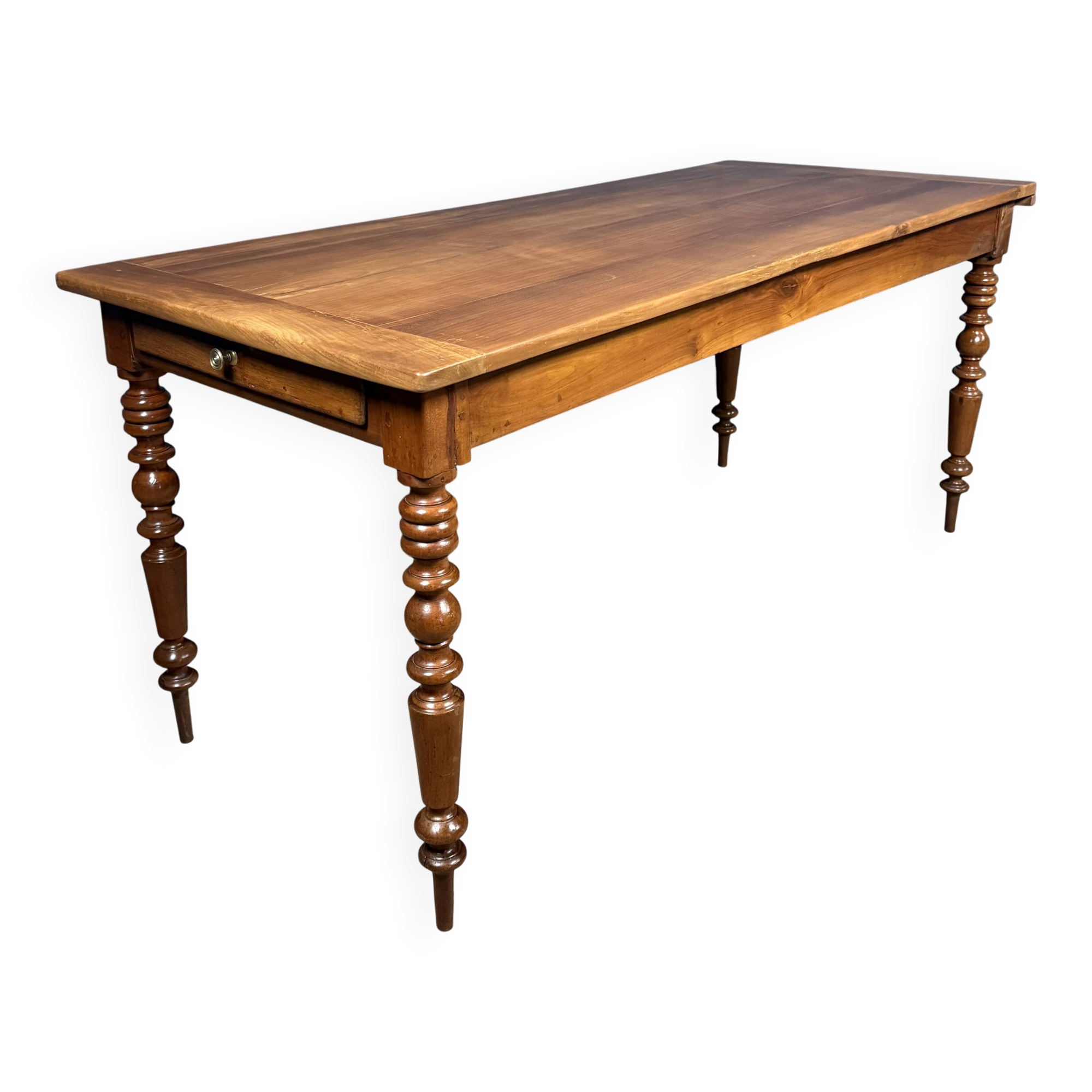 Antique cherry wood dining table from France.