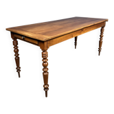 Antique cherry wood dining table from France.