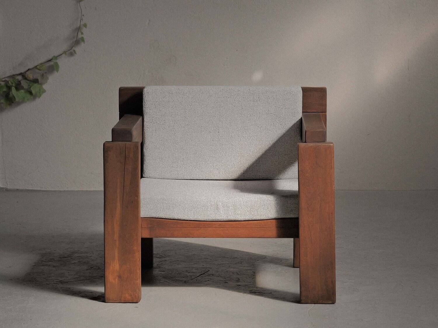 Handcrafted armchair in solid wood and fabric, 1980s-90s.