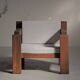 Handcrafted armchair in solid wood and fabric, 1980s-90s.
