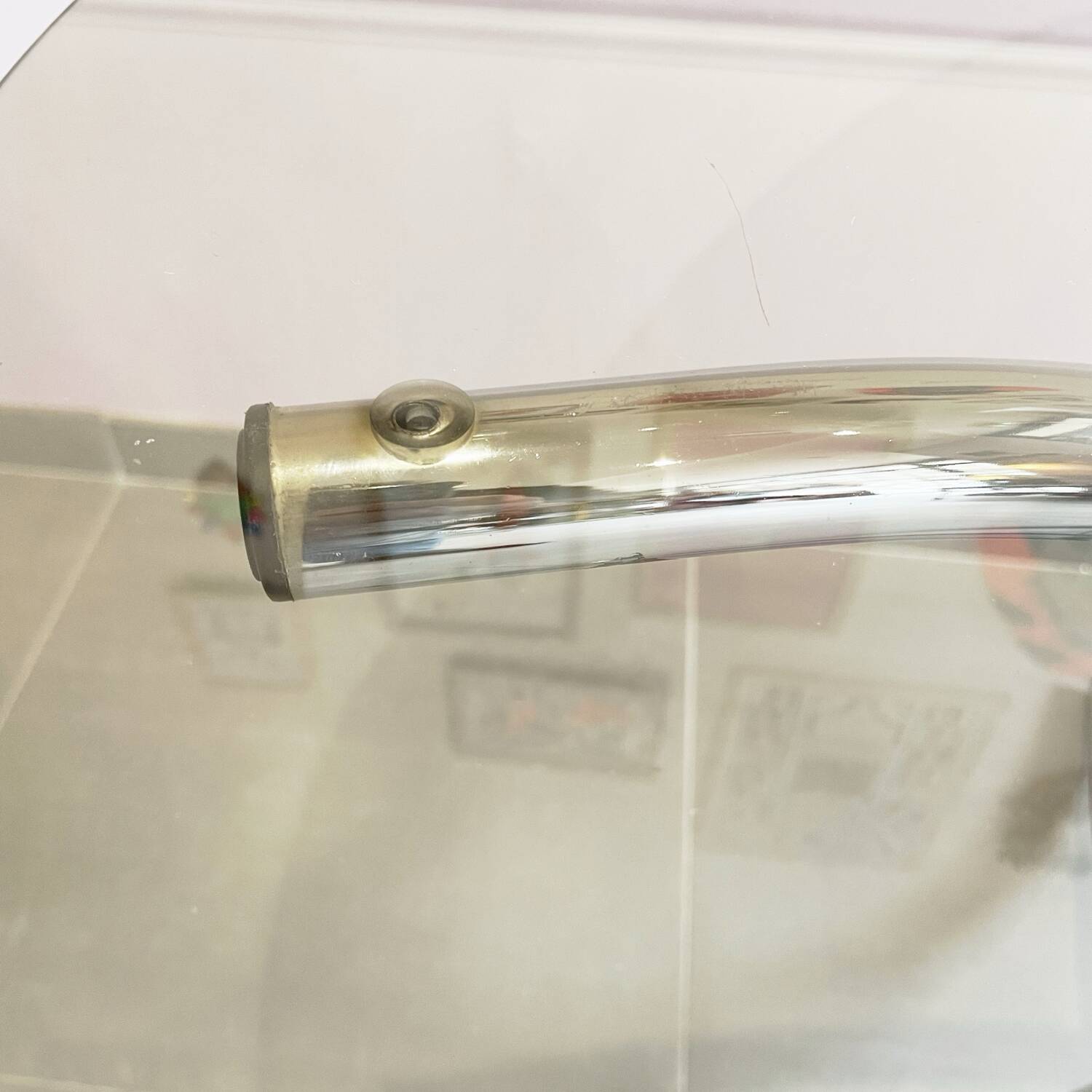 Chromed metal and smoked glass table