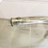 Chromed metal and smoked glass table