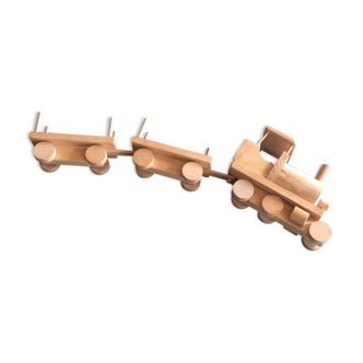 Vintage wooden train locomotive and two cars