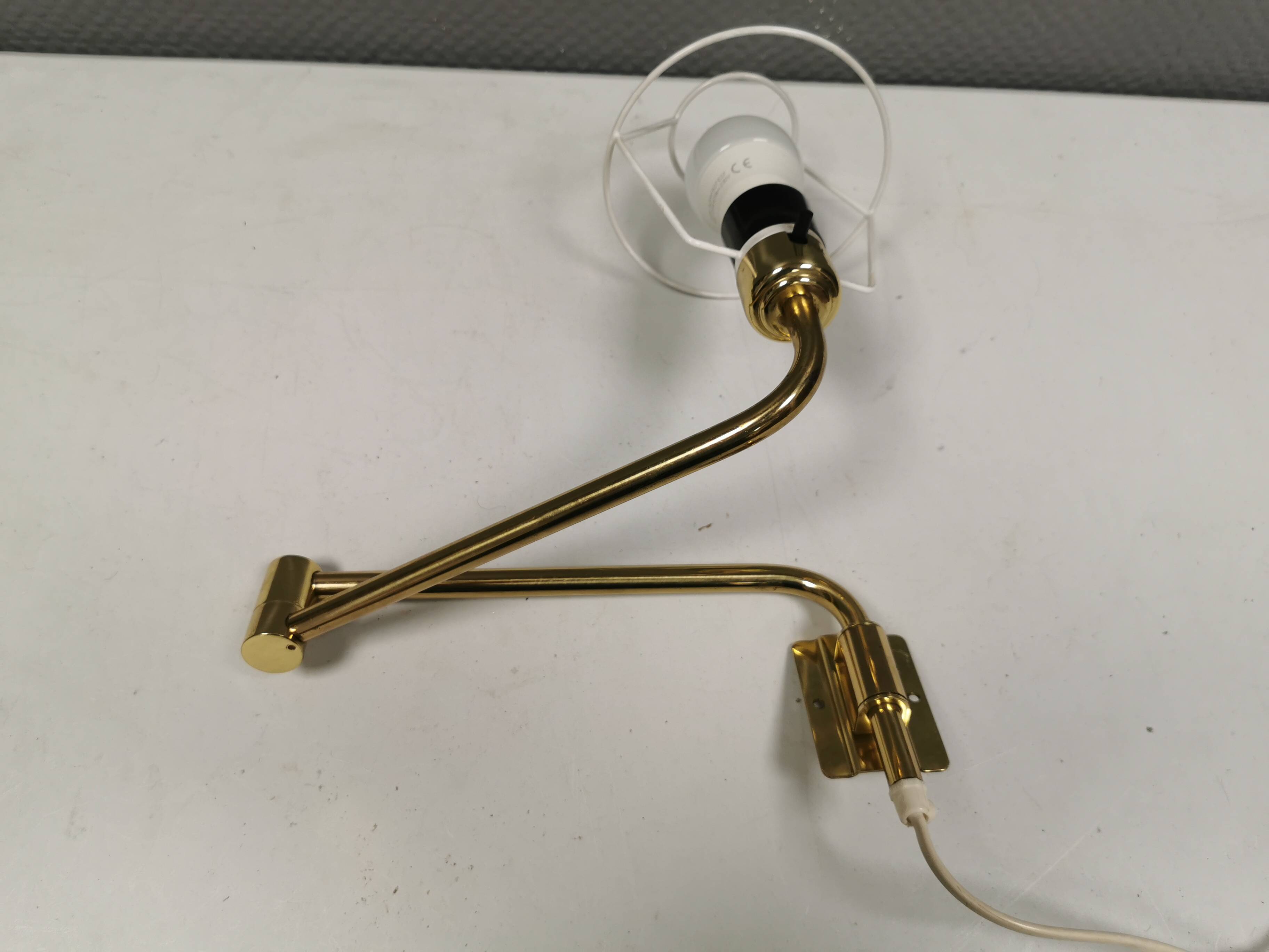 Danish “swing arm” wall lamp in brass by Lyskaer Lightning (LB) 1980s.