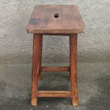Old wooden high stool