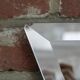 Beveled and triangular art deco mirror 59 x 76 cm