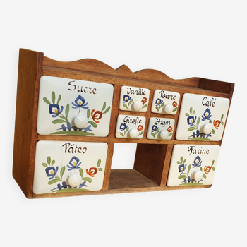 Vintage wooden spice rack with ceramic drawers