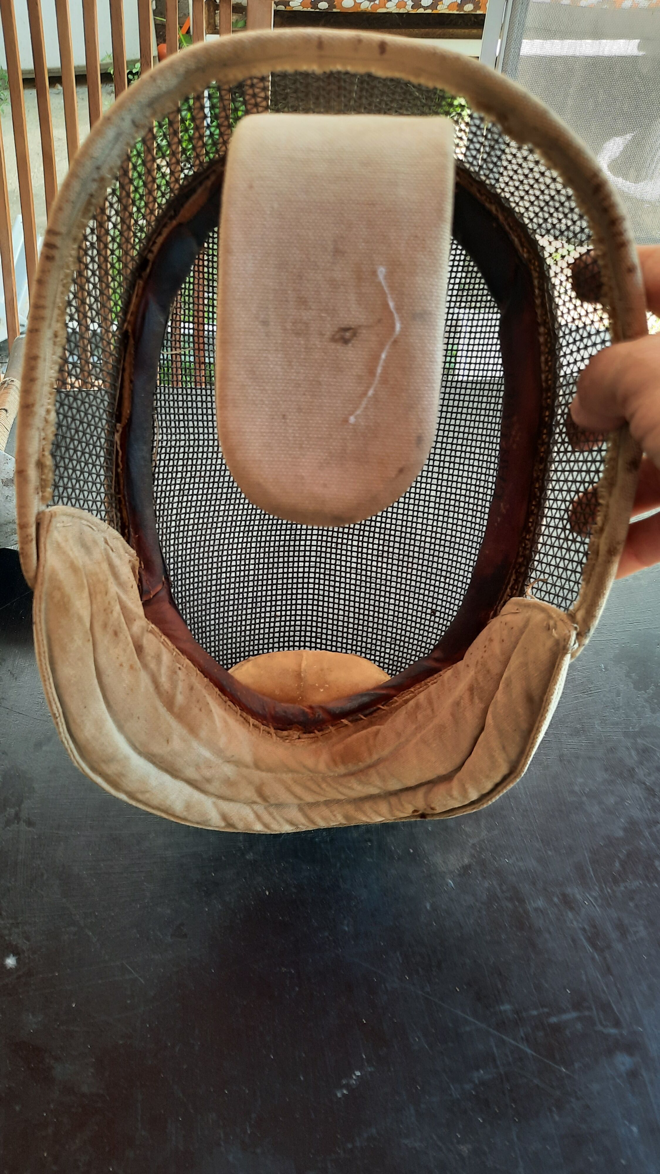 Pair of old fencing mask and foil