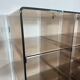 Shelf - library with 24 smoked plexiglass compartments by Michel Dumas