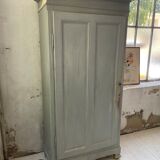 Blue patinated cap cabinet