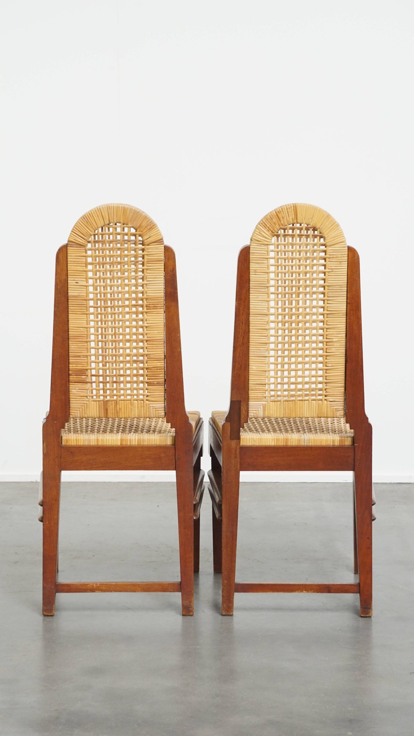 Set of four rattan Art Deco design dining chairs with high back