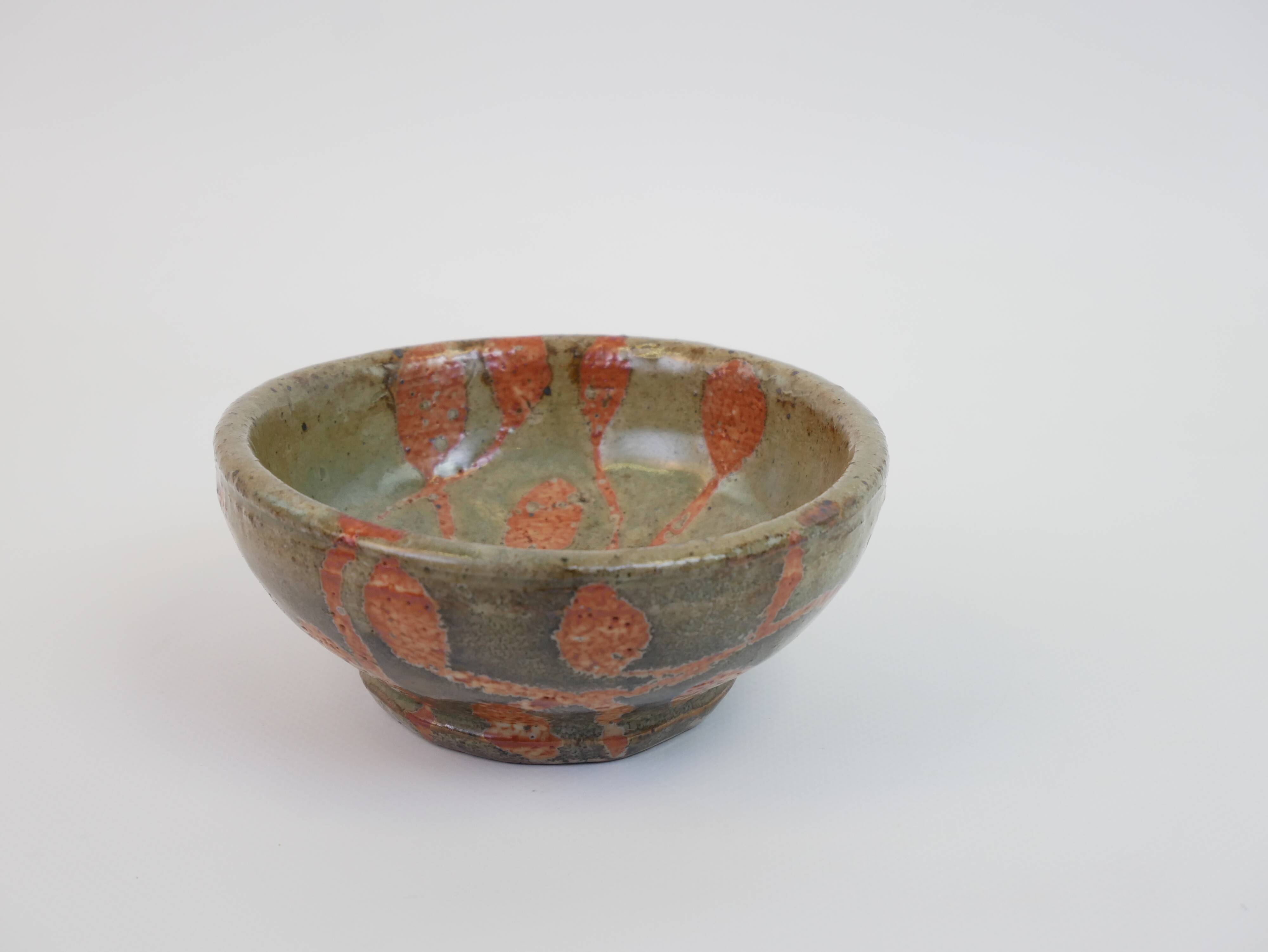 Small bowl in water green glazed ceramic with coral pink pattern