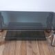 Table basse en verre fumé et pieds chromés années 70