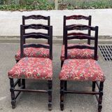 4 Henri II chairs in solid wood and floral burgundy fabric from the 19th century.