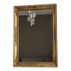 Golden mirror from the late 19th century with decoration. 96x68.