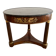 Empire gueridon in mahogany veneer adorned with chiselled and gilded bronze, topped with black marble with a groove.