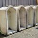 Set of 4 Art Deco style planters in reconstituted stone, 20th century