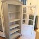 Antique glass-fronted cabinet in pearl grey – country house spirit