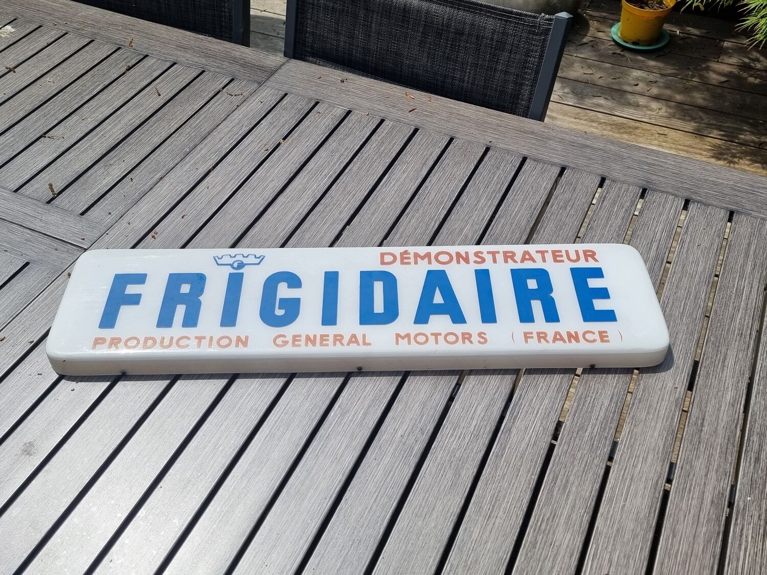 Old plastic fridge advertisement