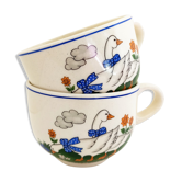 pair of old white bowls with handle vintage Earthenware Art Deco animal decoration: geese with blue ribbons