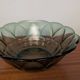 Vintage green smoked glass coupe with geometric decoration.