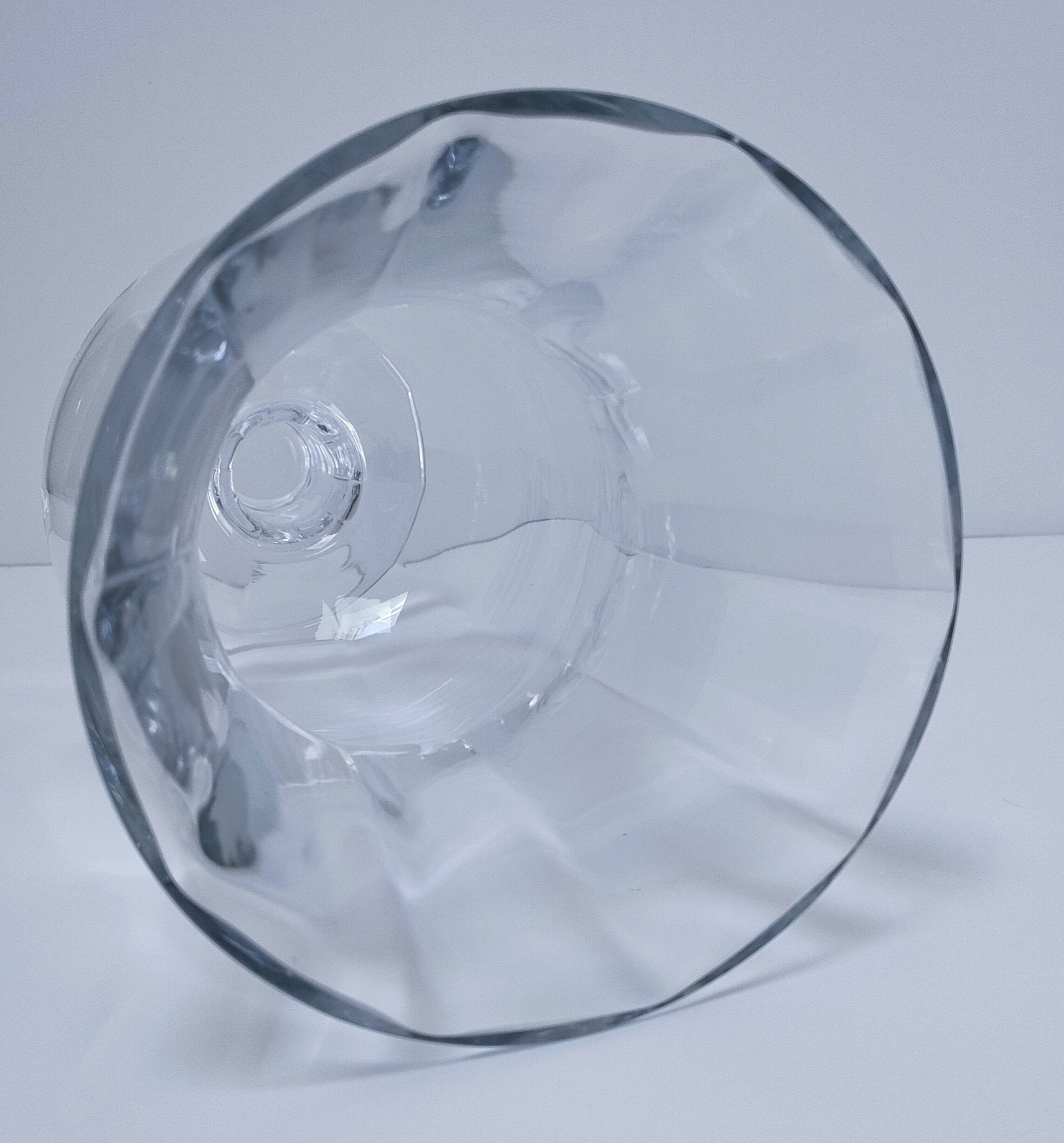 Pair of tall clear glass candlesticks from the early 20th century