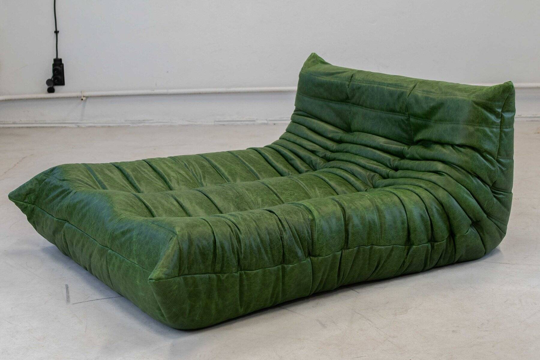 Togo chaise lounge in green leather attributed to Michel Ducaroy for Ligne Roset, 1974