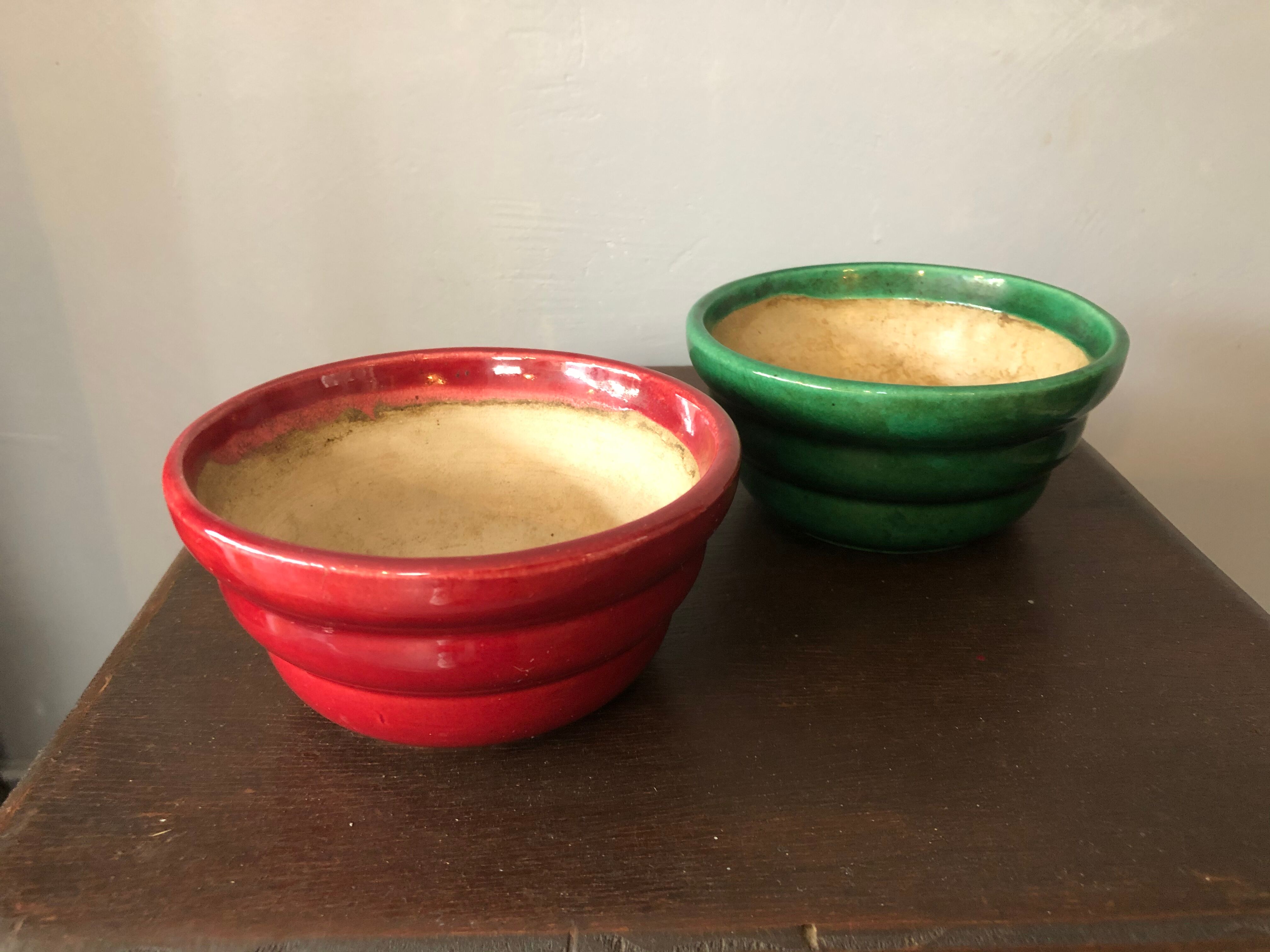 Duo of ceramic potholes